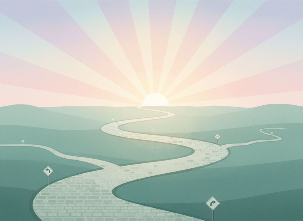 Winding road leading to sunrise.