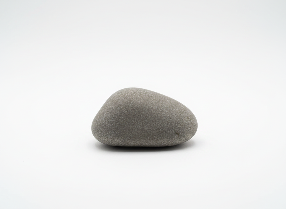 Smooth gray stone on white background